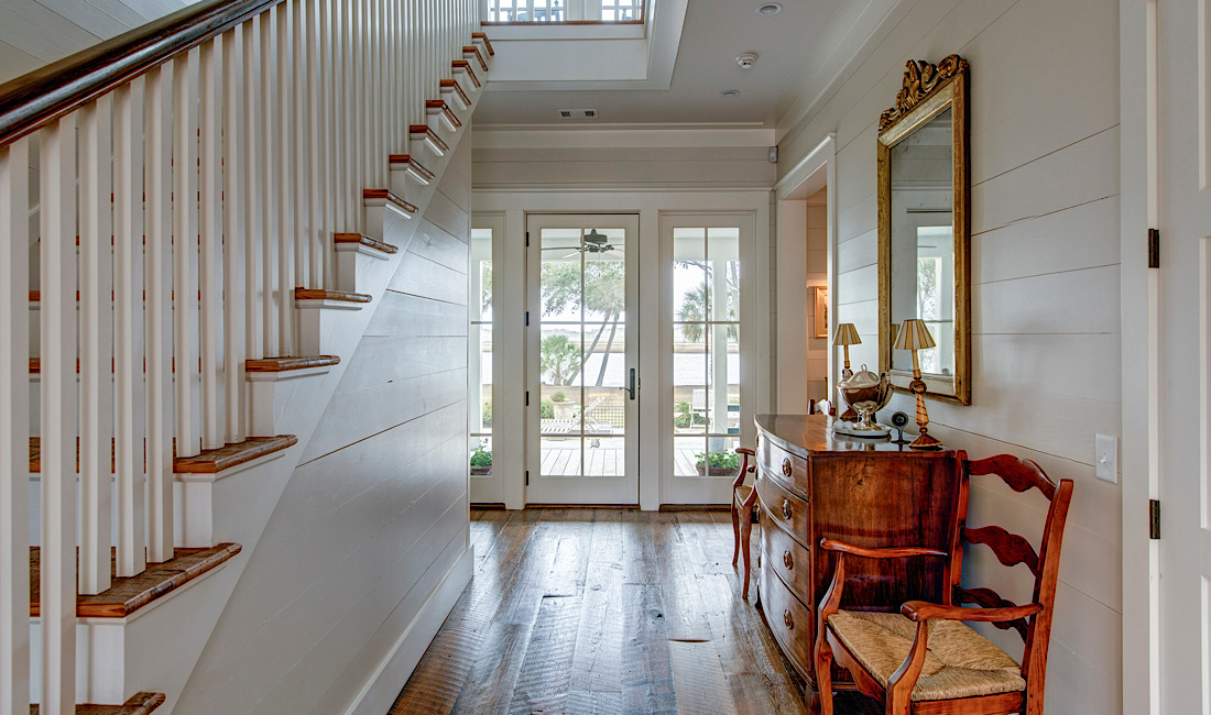 Entry way of historical home with window pane doors in Meridian, ID.