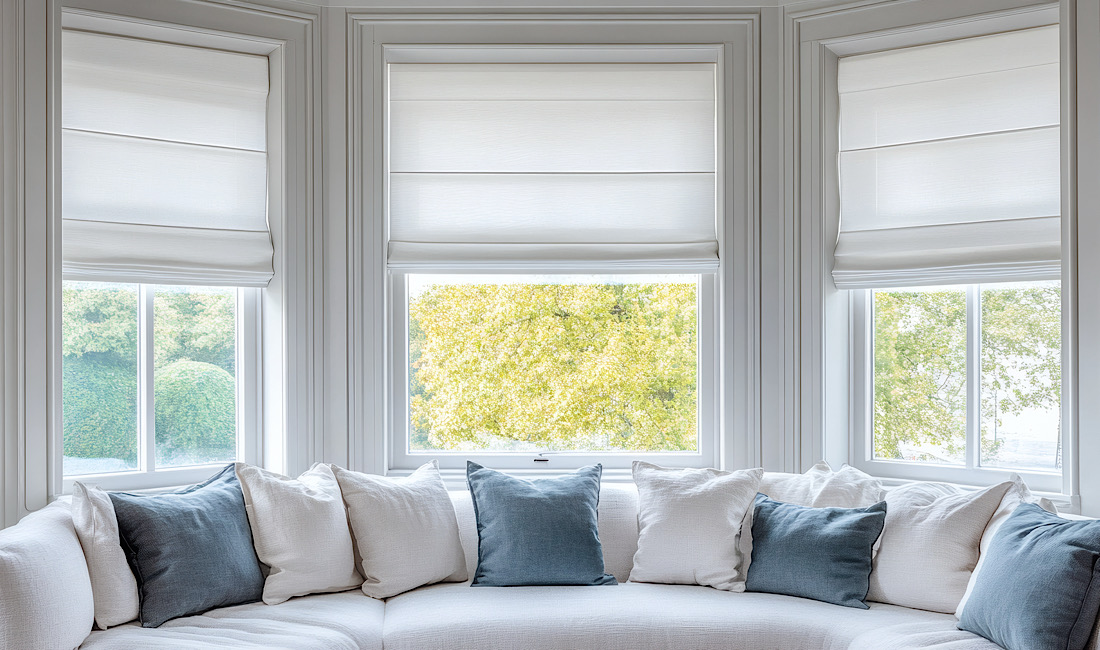 Window seating with blinds and sunshine coming into home in Meridian, ID.